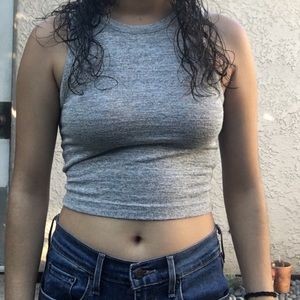 Grey sleeveless crop top.